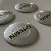 original.jpeg 4 pcs (Set) 56mm - 2.20inch Silver Nissan Wheel Center Hub Caps Stickers