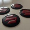 original.jpeg 4 pcs (Set) 56mm - 2.20inch Black & Red Suzuki Wheel Center Hub Caps Stickers